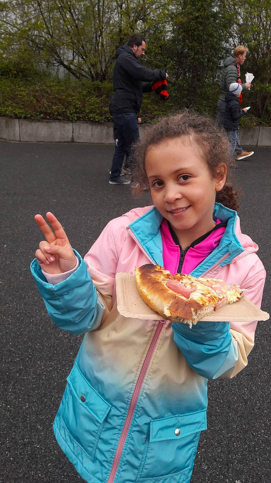 Emilia is registered to the contest to win money with this photo: clothing, cuisine, dessert, event, finger, fish, food, fun, gesture, glove, happy, jewellery, joy, leisure, person, recreation, scarf, smile, thumb, toddler