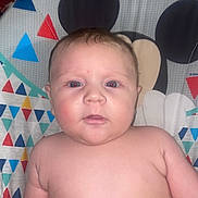 Asher joined the competition — help win amazing prizes! baby, child, chubby, colorful, curious, cute, expression, face, furniture, head, indoors, infant, mickey_mouse, pattern, person, plastic, seat, skin, straps, triangle