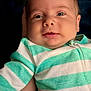 Ronin joined the competition — help win amazing prizes! baby, infant, child, face, striped_clothing, onesie, hand, portrait, closeup, sleepy, cute, soft_light, indoor, skin, young_child, human, person, head, expression, newborn
