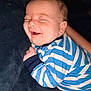 Ronin is registered to the contest to win money with this photo: baby, smiling, sleeping, blue_striped_onesie, infant, cute, soft_surface, portrait, child, happy, closed_eyes, chubby_cheeks, newborn, resting, cozy, indoor, young_child, peaceful, small_hands, head