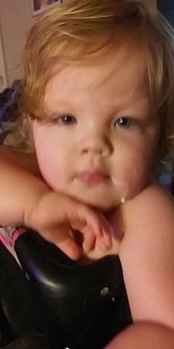 Harper is registered to the contest to win money with this photo: arm, baby, baby_toddler_clothing, cheek, chest, child, ear, eyelash, finger, gesture, happy, jaw, lip, mouth, nail, nose, person, sitting, skin, thumb