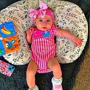 Audrey joined the competition — help win amazing prizes! baby, baby_girl, blue_eyes, carpet, child, colorful, cushion, cute, headband, indoor, infant, leaf_pattern, onesie, phone_case, pink_bow, portrait, relaxing, sneakers, soft_fabric, toy