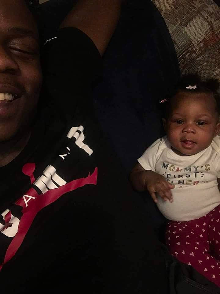 Aniya is registered to the contest to win money with this photo: audio_equipment, baby, baby_toddler_clothing, black, carmine, child, elbow, event, finger, fun, gesture, hairstyle, happy, human_body, organ, person, sleeve, smile, sportswear, t_shirt