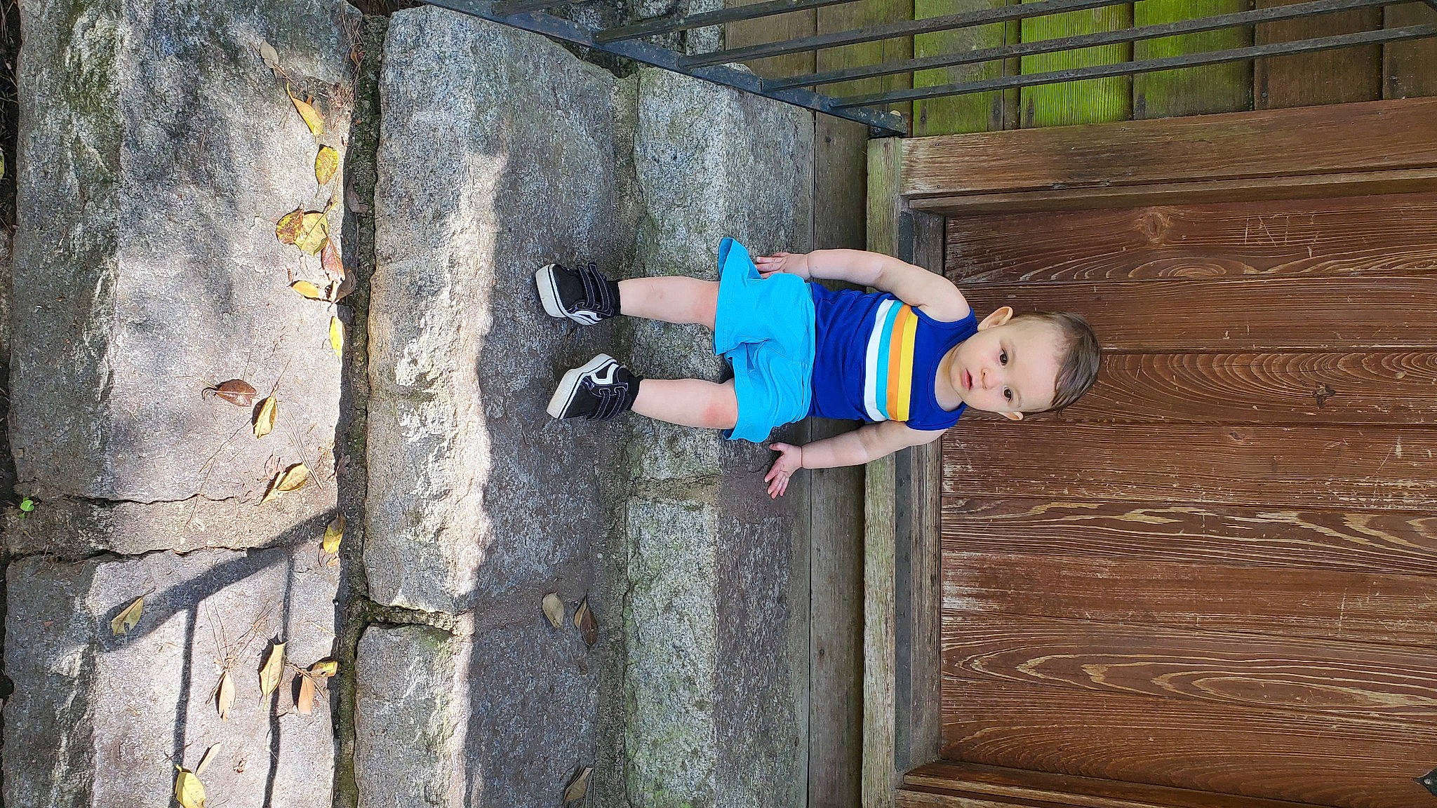 Gianni joined the competition — help win amazing prizes! child, concrete, elbow, electric_blue, fun, hardwood, human_leg, leisure, person, recreation, sitting, t_shirt, thigh, toddler, wood