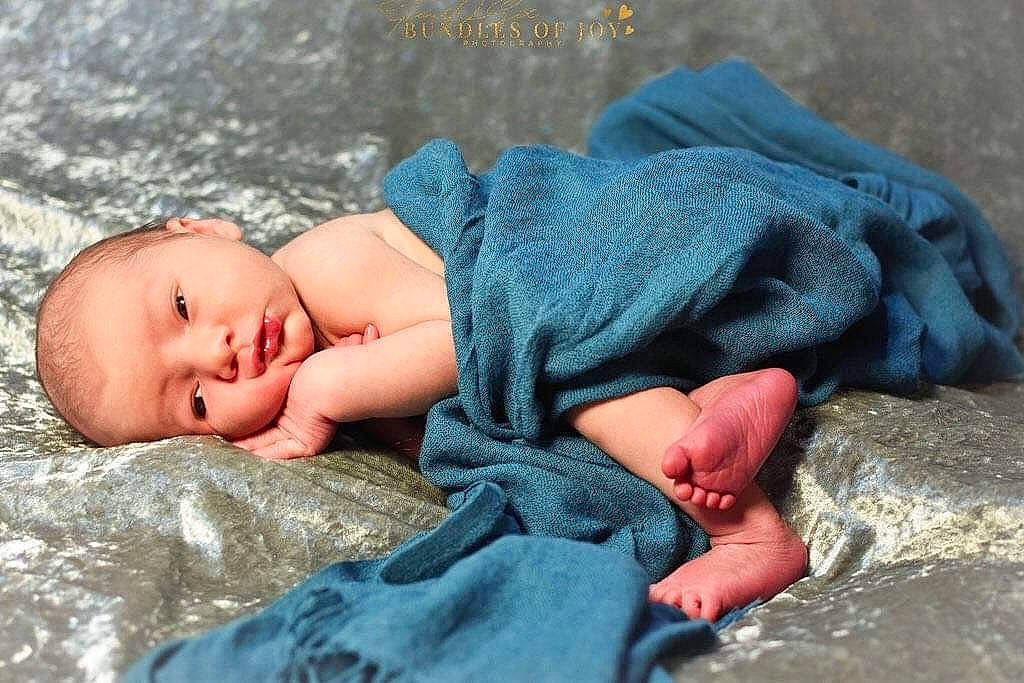 Eastan joined the competition — help win amazing prizes! azure, baby, baby_toddler_clothing, cheek, child, comfort, grass, linens, mammal, nap, pattern, person, rock, sitting, skin, sleep, textile, toddler, vertebrate, wood