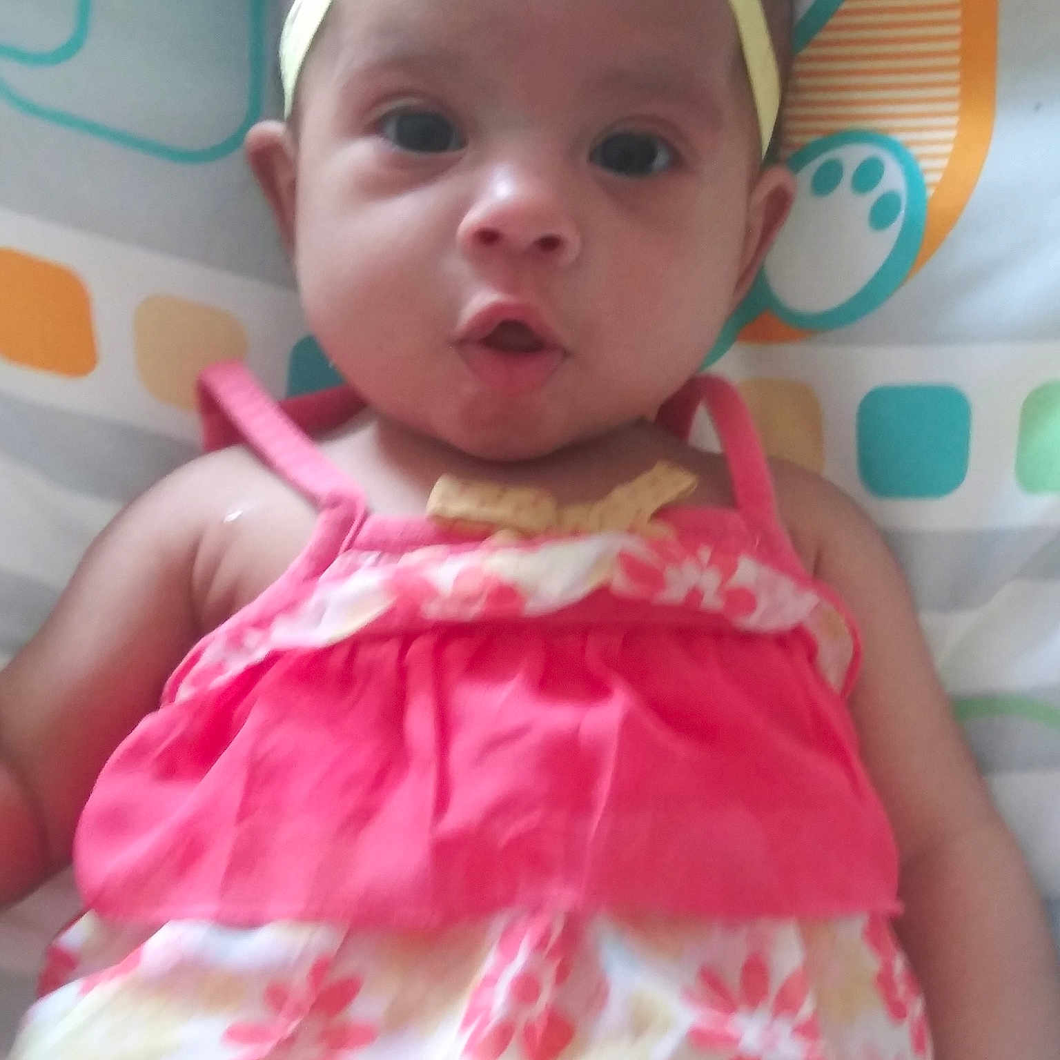 Annaleigh is registered to the contest to win money with this photo: baby, baby_toddler_clothing, cheek, child, doll, dress, hair_accessory, head, headgear, person, pink, skin, smile, toddler