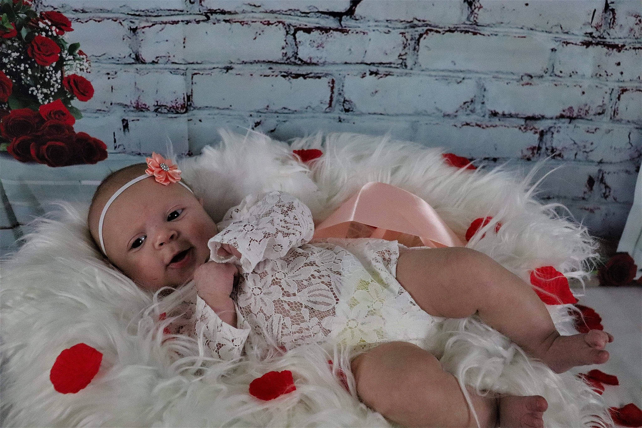 Cattleya is registered to the contest to win money with this photo: baby_toddler_clothing, beauty, brick, brickwork, child, doll, dress, embellishment, event, happy, hat, headpiece, organ, person, photograph, pink, red, textile, toddler, toy