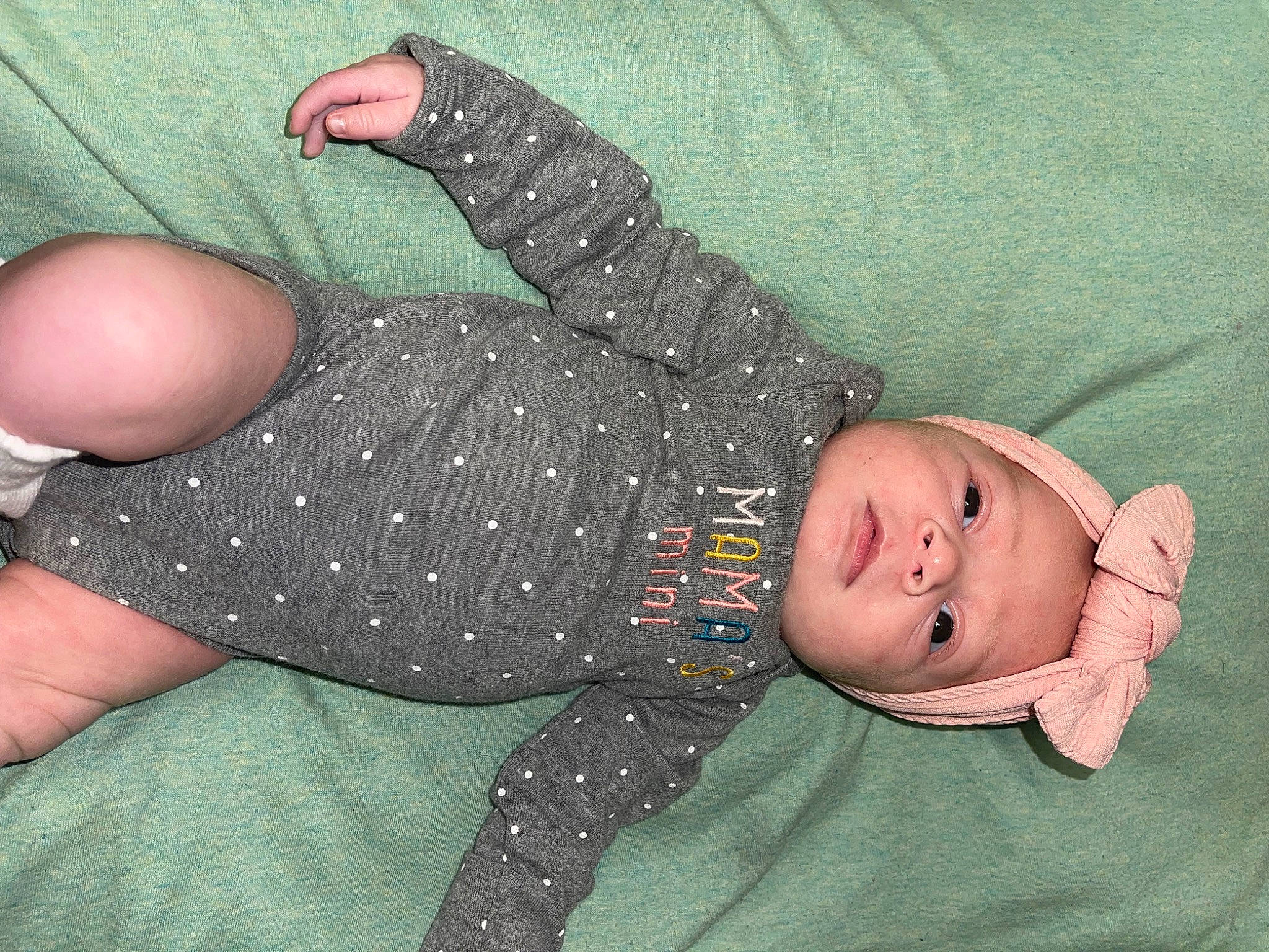 Cattleya joined the competition — help win amazing prizes! arm, baby, baby_products, baby_toddler_clothing, comfort, finger, foot, gesture, grass, human_body, human_leg, lap, leg, pattern, person, sitting, skin, sleeve, sock, thumb