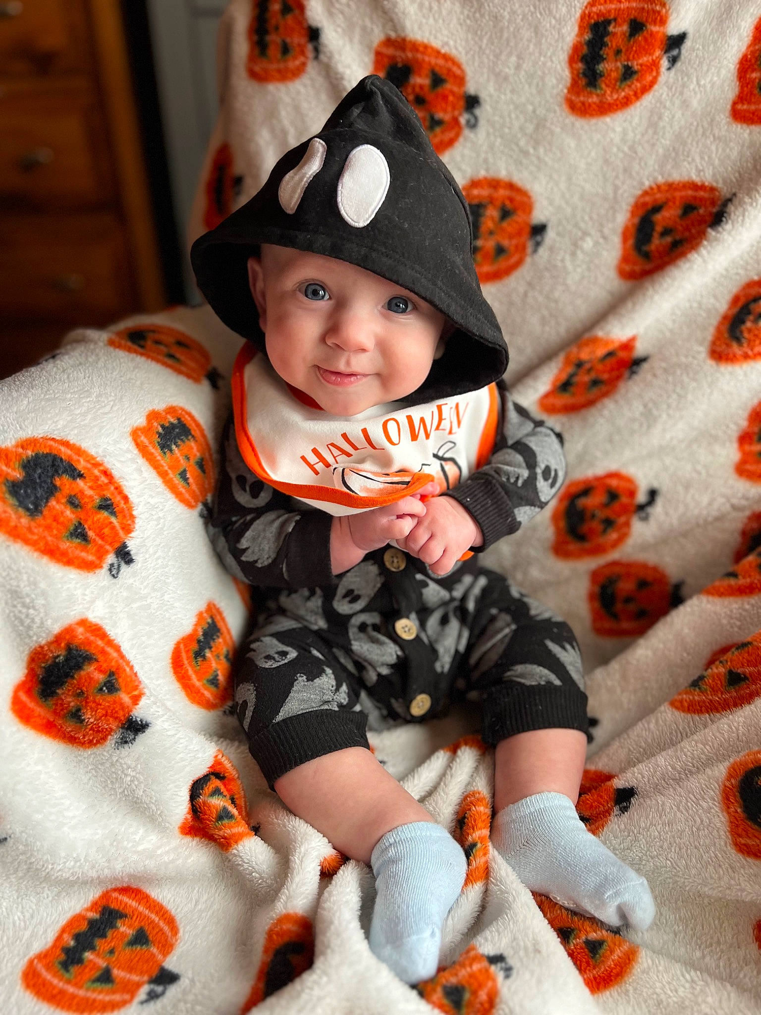 Wyatt joined the competition — help win amazing prizes! baby, baby_toddler_clothing, cap, child, comfort, face, fun, happy, head, headwear, mammal, orange, pattern, people, person, sleeve, smile, sock, textile, toddler