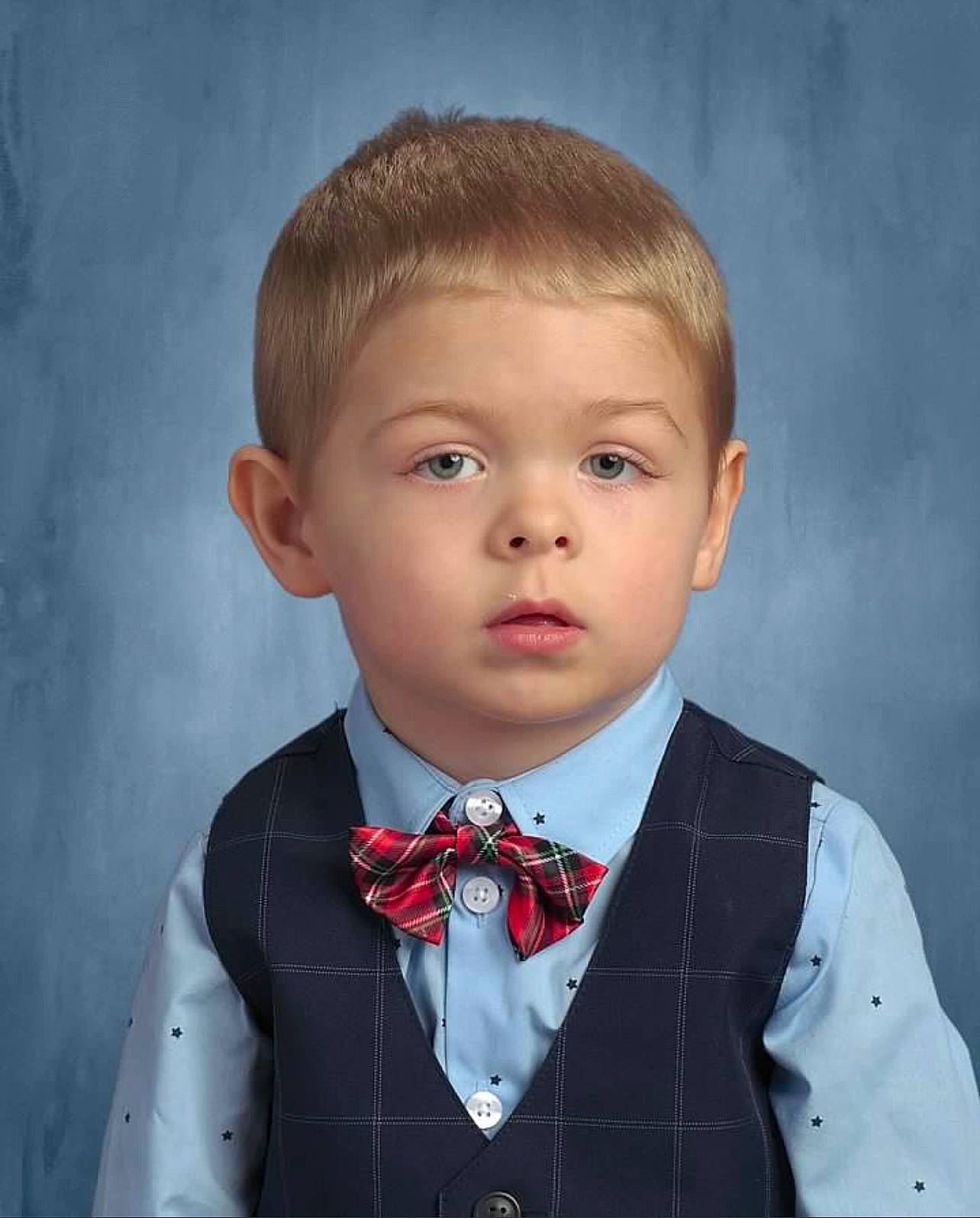 Ethan is registered to the contest to win money with this photo: blazer, blond, bow_tie, button, chin, collar, dress_shirt, eyebrow, face, flash_photography, formal_wear, happy, human_body, lip, neck, nose, person, school_uniform, sleeve, tie