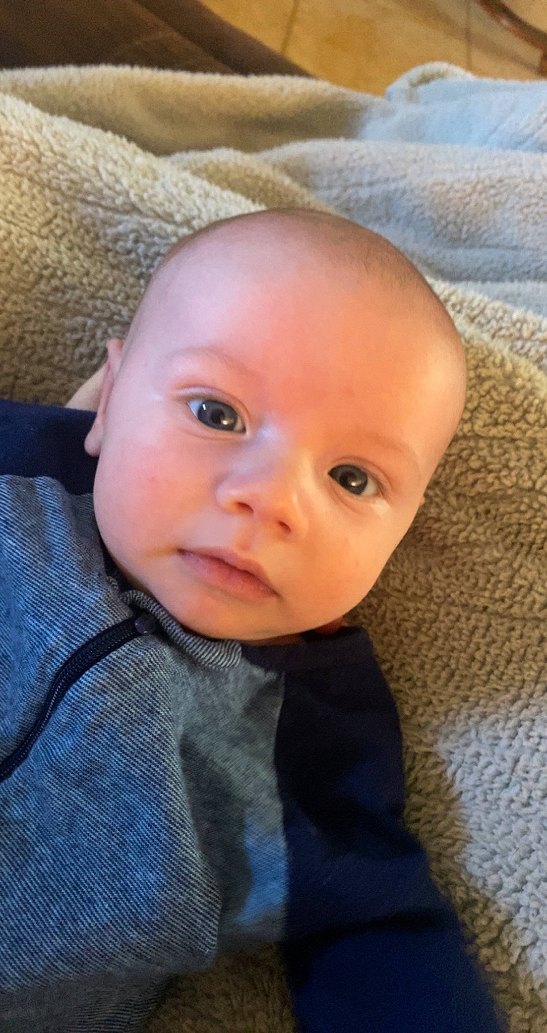Liam joined the competition — help win amazing prizes! baby, baby_toddler_clothing, cheek, child, collar, comfort, electric_blue, eye, eyebrow, eyelash, head, iris, linens, lip, nose, person, sitting, skin, sleeve, toddler