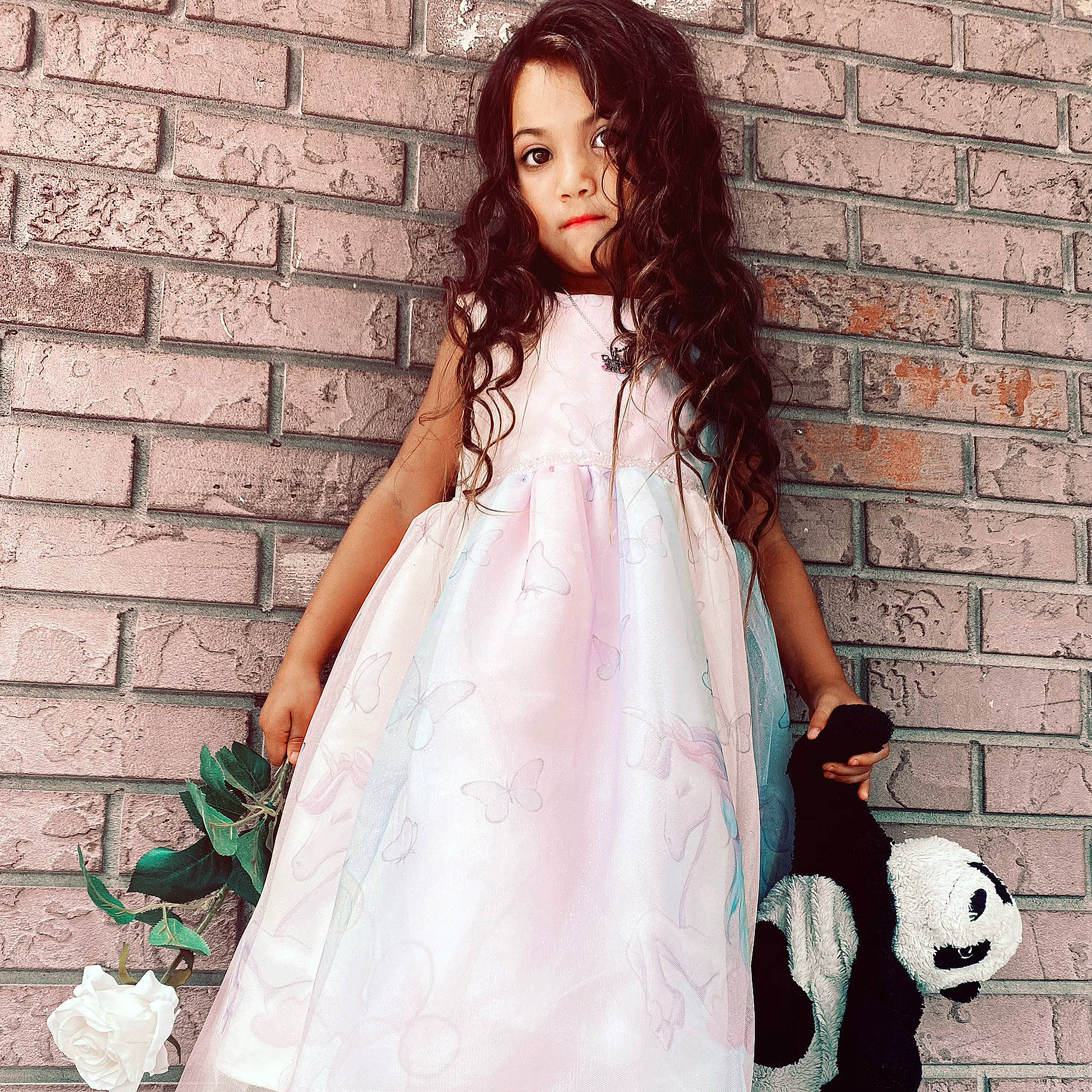 Violeta is registered to the contest to win money with this photo: a_line, beauty, child, child_model, clothing, day_dress, dress, fashion, fashion_design, formal_wear, joint, long_hair, neck, pattern, peach, person, pink, shoulder, textile, waist