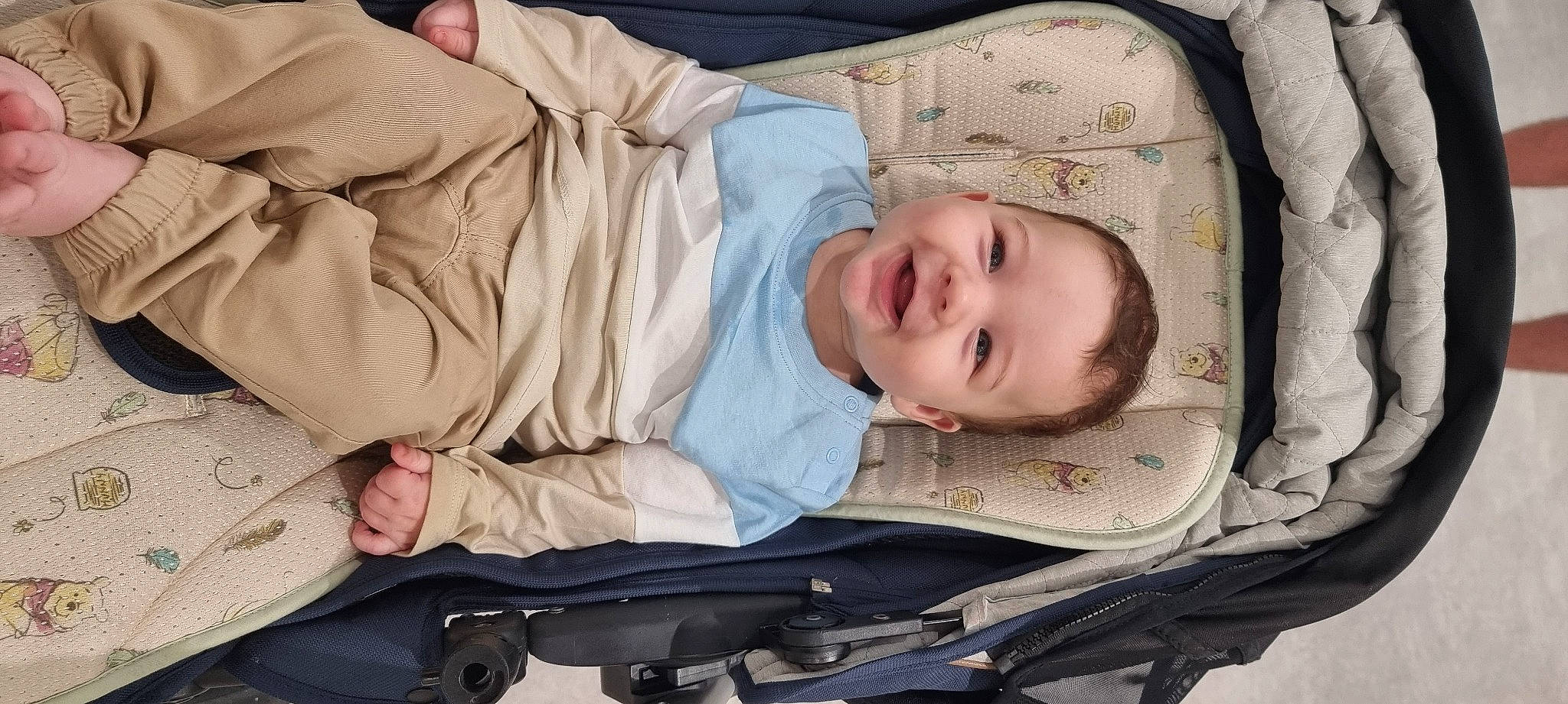 Joey is registered to the contest to win money with this photo: baby, baby_carriage, baby_laughing, baby_products, baby_safety, baby_toddler_clothing, cheek, child, comfort, eye, happy, joy, linens, people, person, skin, sleeve, smile, toddler, wood