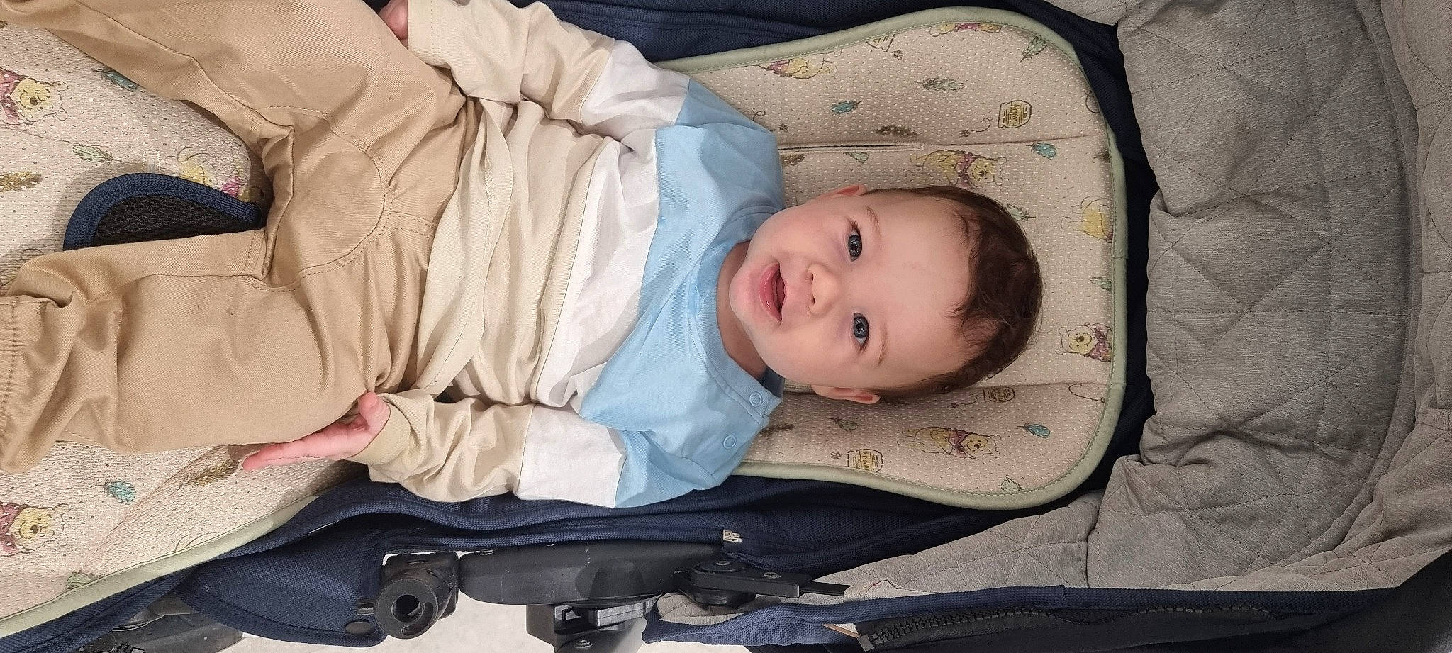 Joey joined the competition — help win amazing prizes! baby, baby_carriage, baby_products, baby_safety, baby_toddler_clothing, cheek, child, comfort, eye, linens, mammal, person, sitting, skin, sleeve, smile, toddler, vertebrate, wood