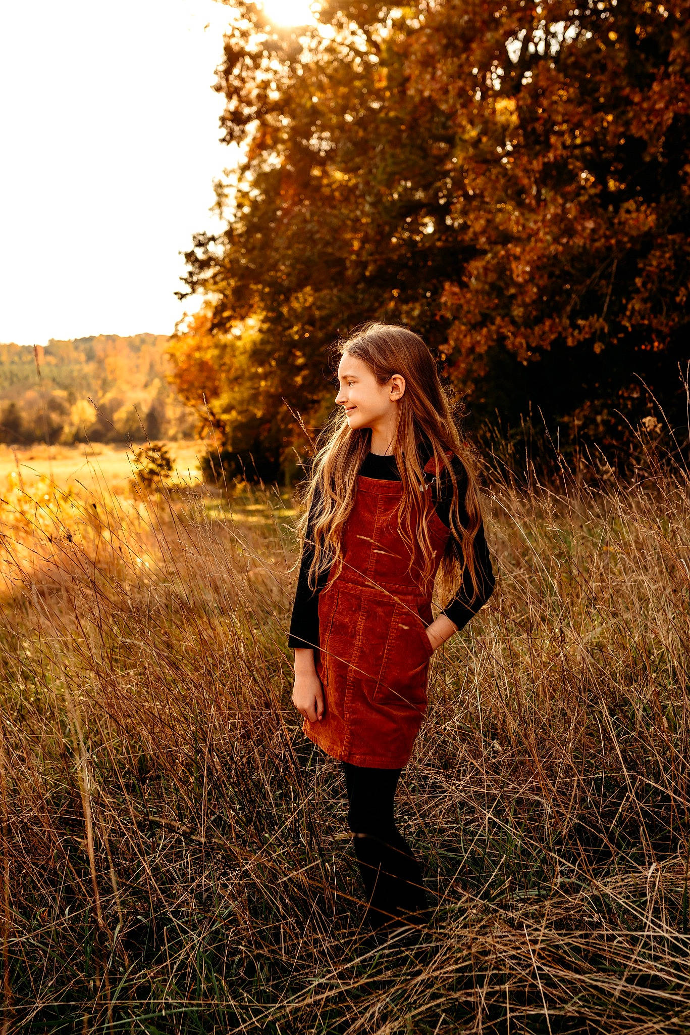 Lilli is registered to the contest to win money with this photo: branch, fawn, flash_photography, grass, grassland, hair, happy, joy, landscape, morning, natural_environment, natural_landscape, nature, people_in_nature, person, plant, sky, street_fashion, sunlight, tints_and_shades