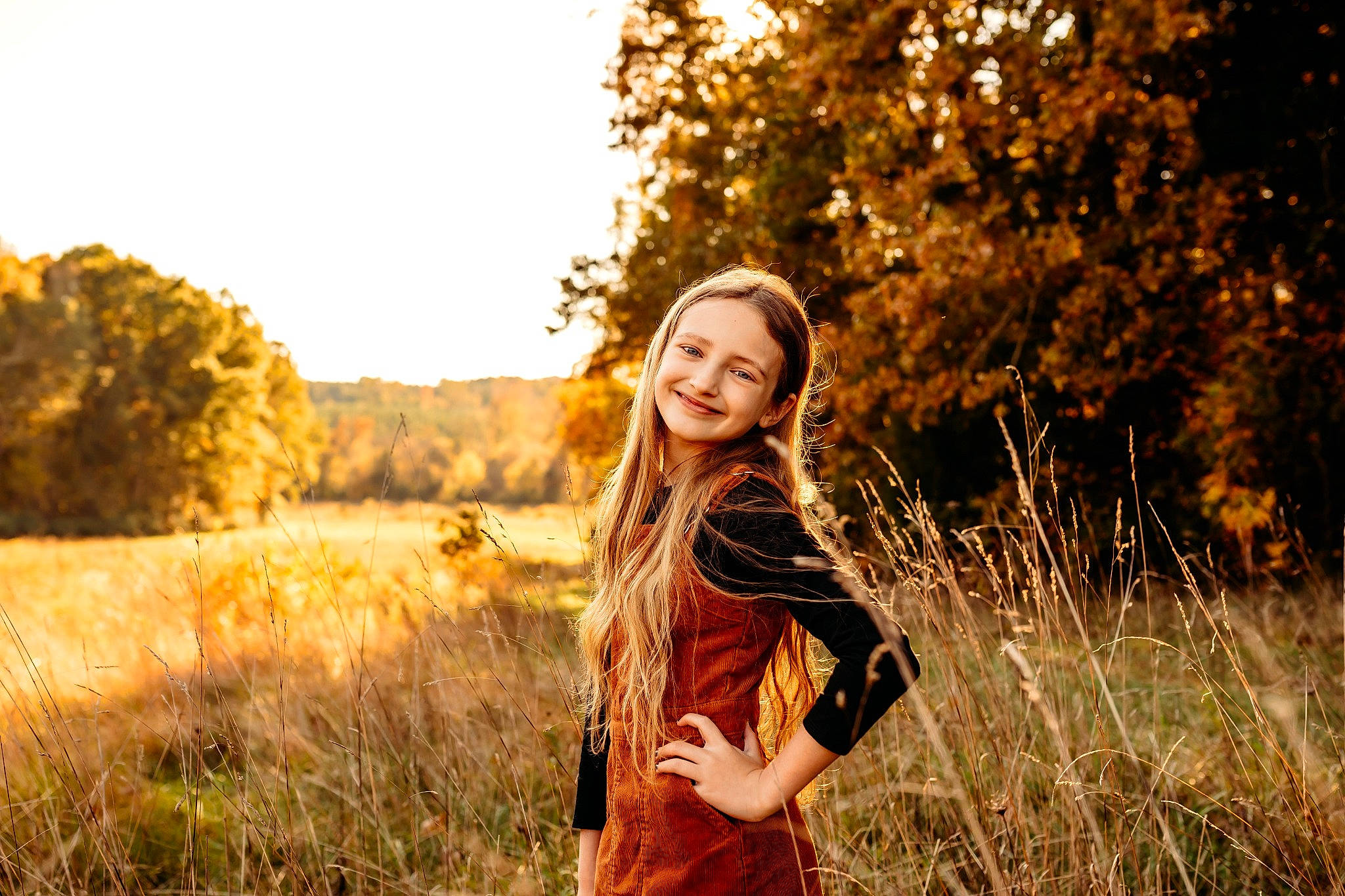 Lilli is registered to the contest to win money with this photo: beauty, dress, fawn, flash_photography, grass, grassland, happy, joy, landscape, meadow, natural_landscape, nature, orange, people_in_nature, person, plant, sky, smile, street_fashion, sunlight
