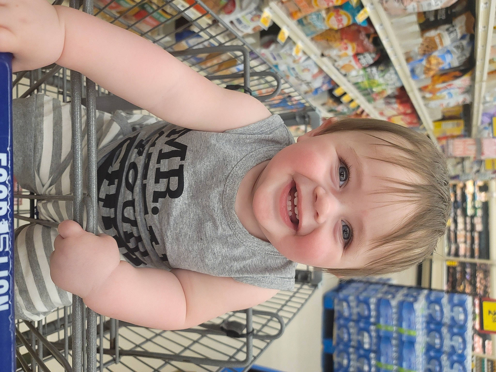 Chase joined the competition — help win amazing prizes! baby_toddler_clothing, blue, bookcase, child, customer, fun, hairstyle, happy, iris, joy, leisure, pattern, person, play, publication, retail, shelf, shelving, smile, t_shirt
