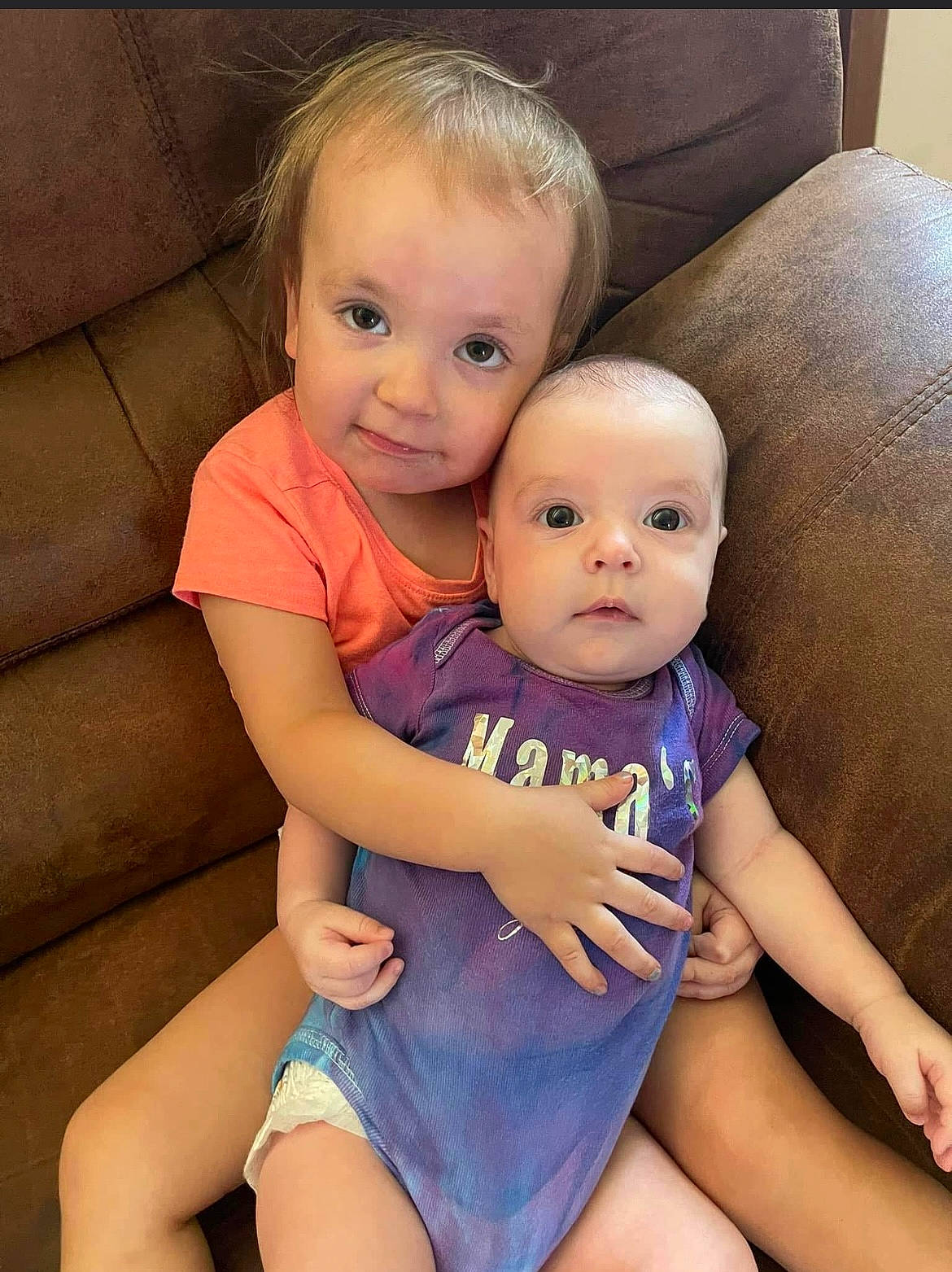 Aubrie joined the competition — help win amazing prizes! baby, baby_toddler_clothing, cheek, comfort, couch, eye, face, finger, hair, hairstyle, happy, head, human_body, iris, lap, leg, mouth, person, skin, stomach