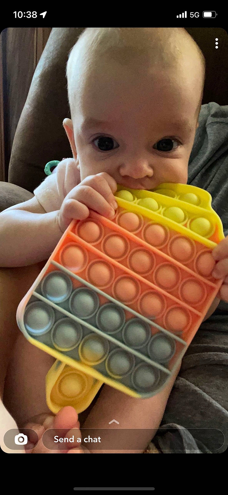 Aubrie is registered to the contest to win money with this photo: art, baby, baby_products, baby_toddler_clothing, child, educational_toy, eyelash, finger, fun, mouth, nail, nose, office_equipment, pattern, person, plastic, play, recreation, thumb, toddler