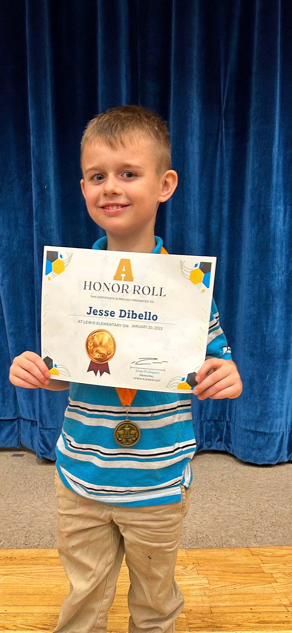 Jesse Lee Dibello is registered to the contest to win money with this photo: blue, child, competition_event, curtain, electric_blue, event, facial_expression, happy, joy, person, room, sleeve, smile, t_shirt, toddler, uniform