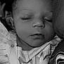 baby, sleeping, infant, face, hand, clothing, fabric, closeup, portrait, black_and_white, peaceful, newborn, soft, rest, cute, child, person, eyelashes, delicate, calm