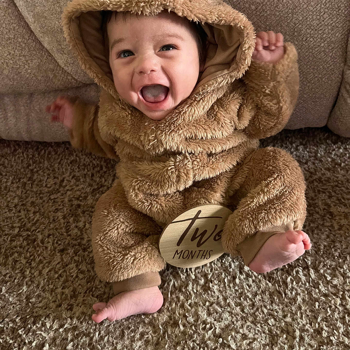 Julian joined the competition — help win amazing prizes! baby, blanket, bonnet, clothing, couch, face, furniture, happy, hat, head, hood, hoodie, knitwear, laughing, person, photography, portrait, sweater, sweatshirt, yawning