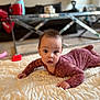Alora joined the competition — help win amazing prizes! baby, blanket, carpet, child, coffee_table, couch, curious, floor, furniture, home, indoor, infant, living_room, mug, patterned_clothing, person, quilt, relaxed, soft_light, wide_eyes