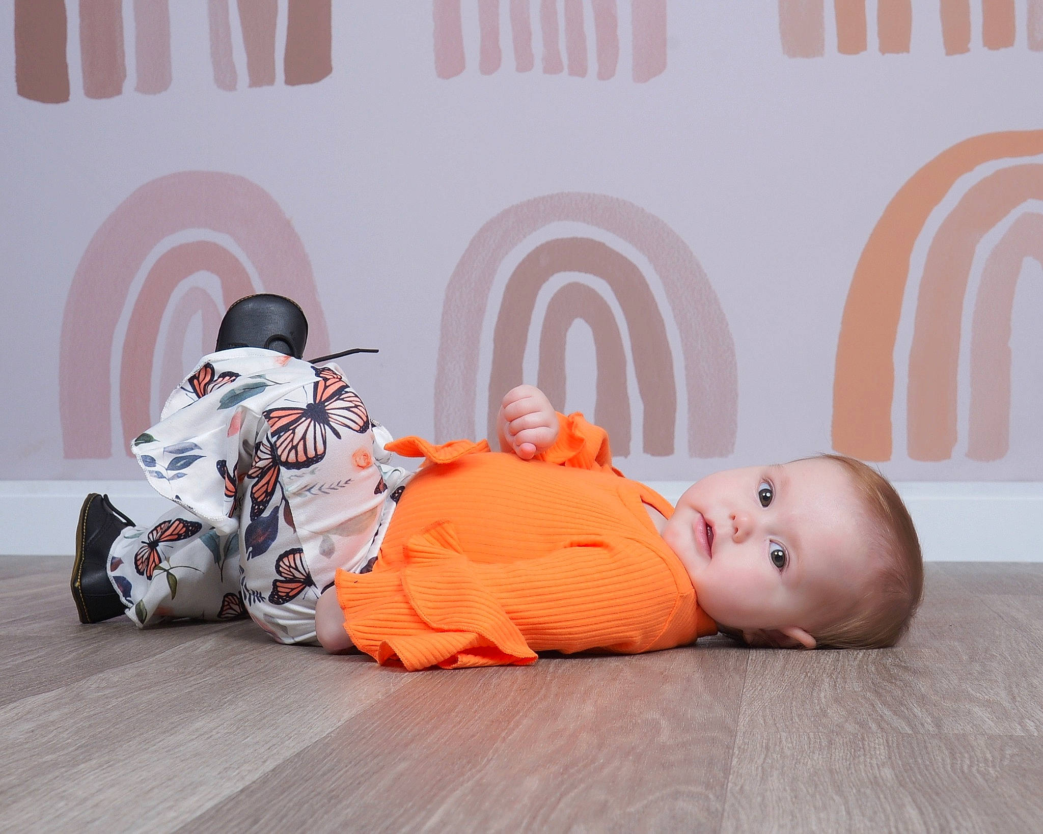 Maya joined the competition — help win amazing prizes! baby, baby_toddler_clothing, bag, carmine, child, comfort, flooring, font, happy, leisure, logo, luggage_and_bags, nap, orange, person, room, sitting, toddler, wood, wood_flooring