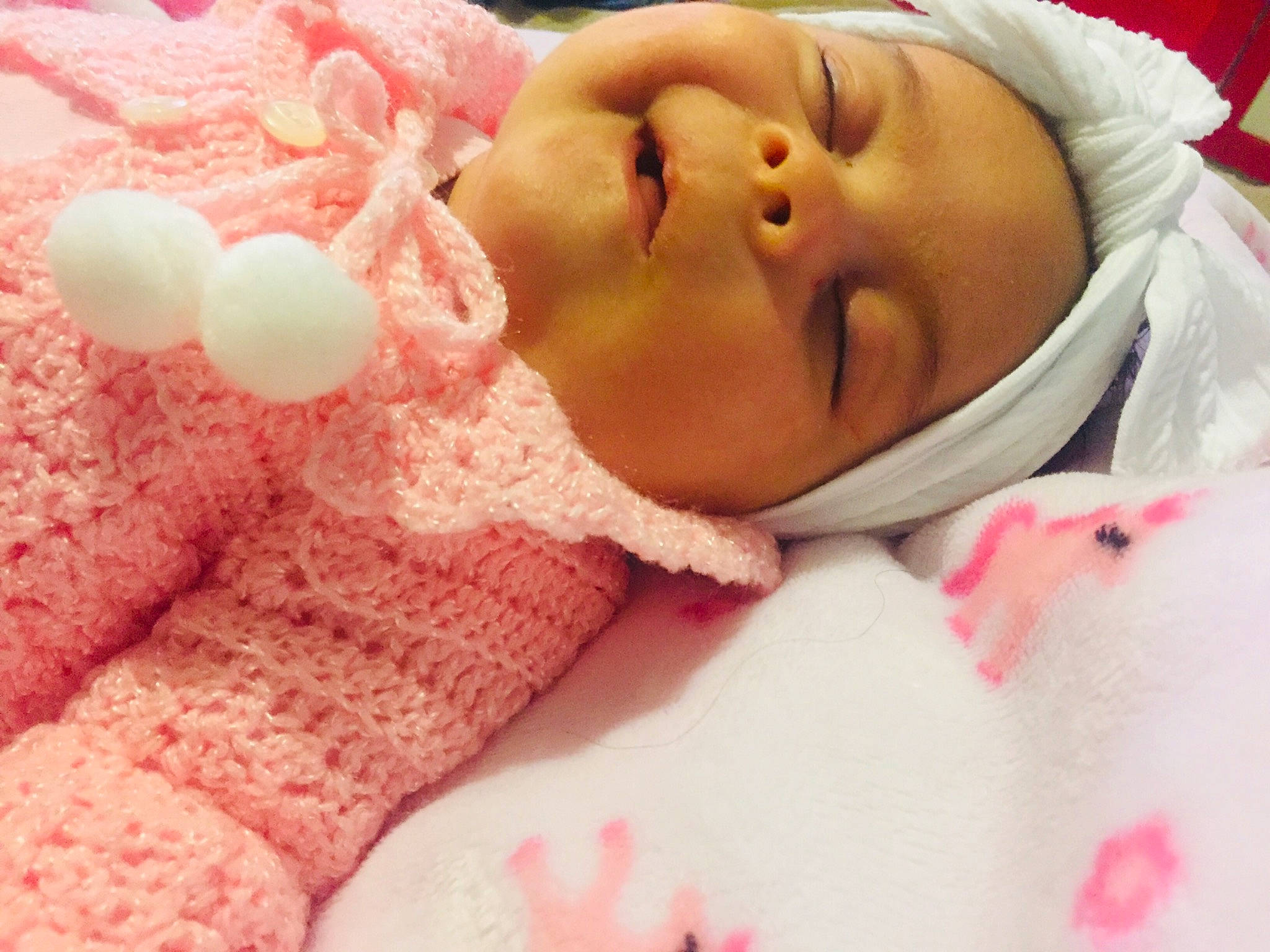 Carolina is registered to the contest to win money with this photo: baby, baby_sleeping, beauty, bedtime, birth, blanket, cheek, child, close_up, eye, face, head, headwear, lip, mouth, nose, person, pink, skin, sleep