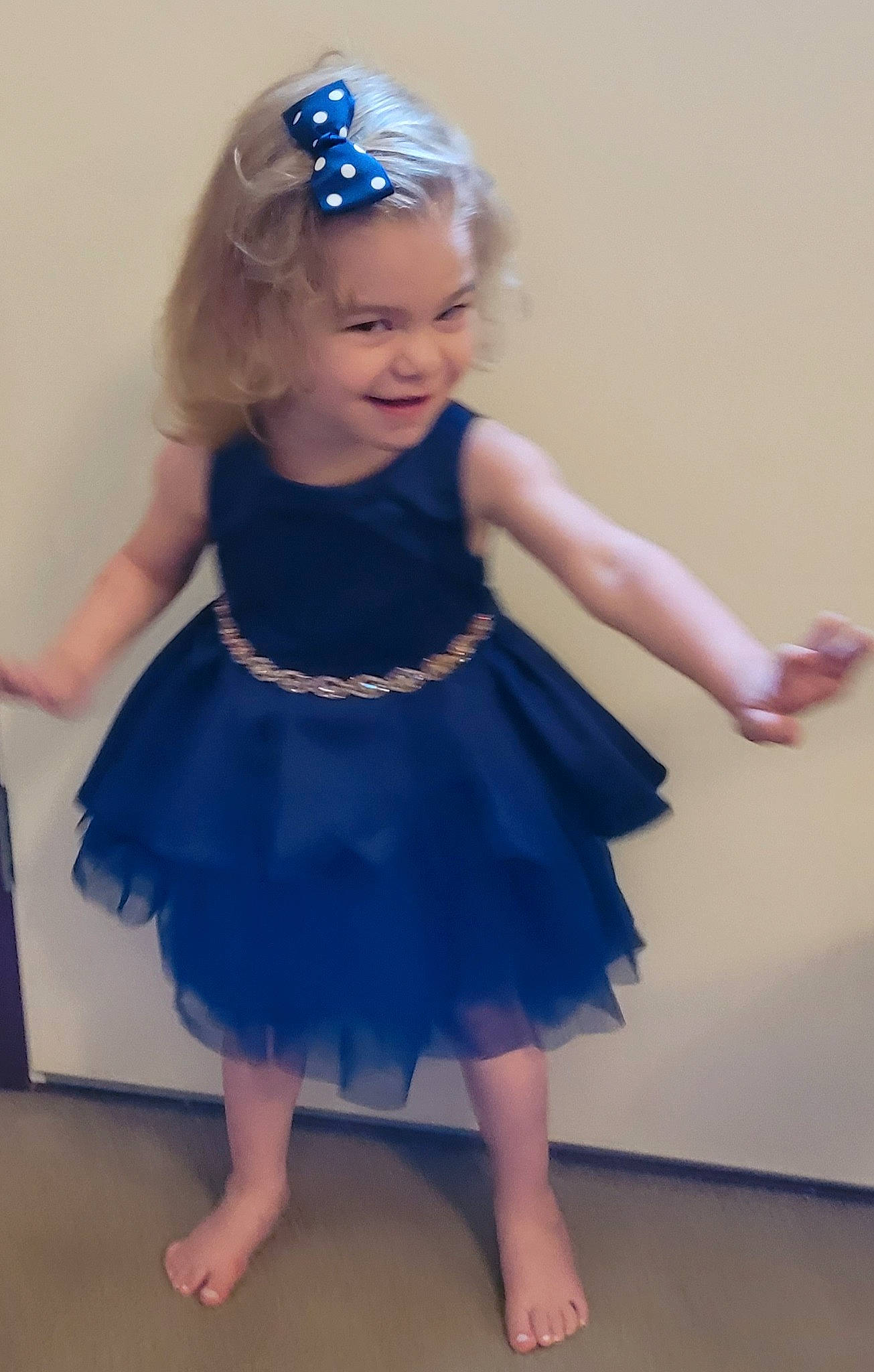 Sandy May is registered to the contest to win money with this photo: baby_toddler_clothing, day_dress, dress, face, facial_expression, hair, hairstyle, happy, hat, head, headgear, iris, joy, one_piece_garment, person, pink, purple, shoulder, skin, smile