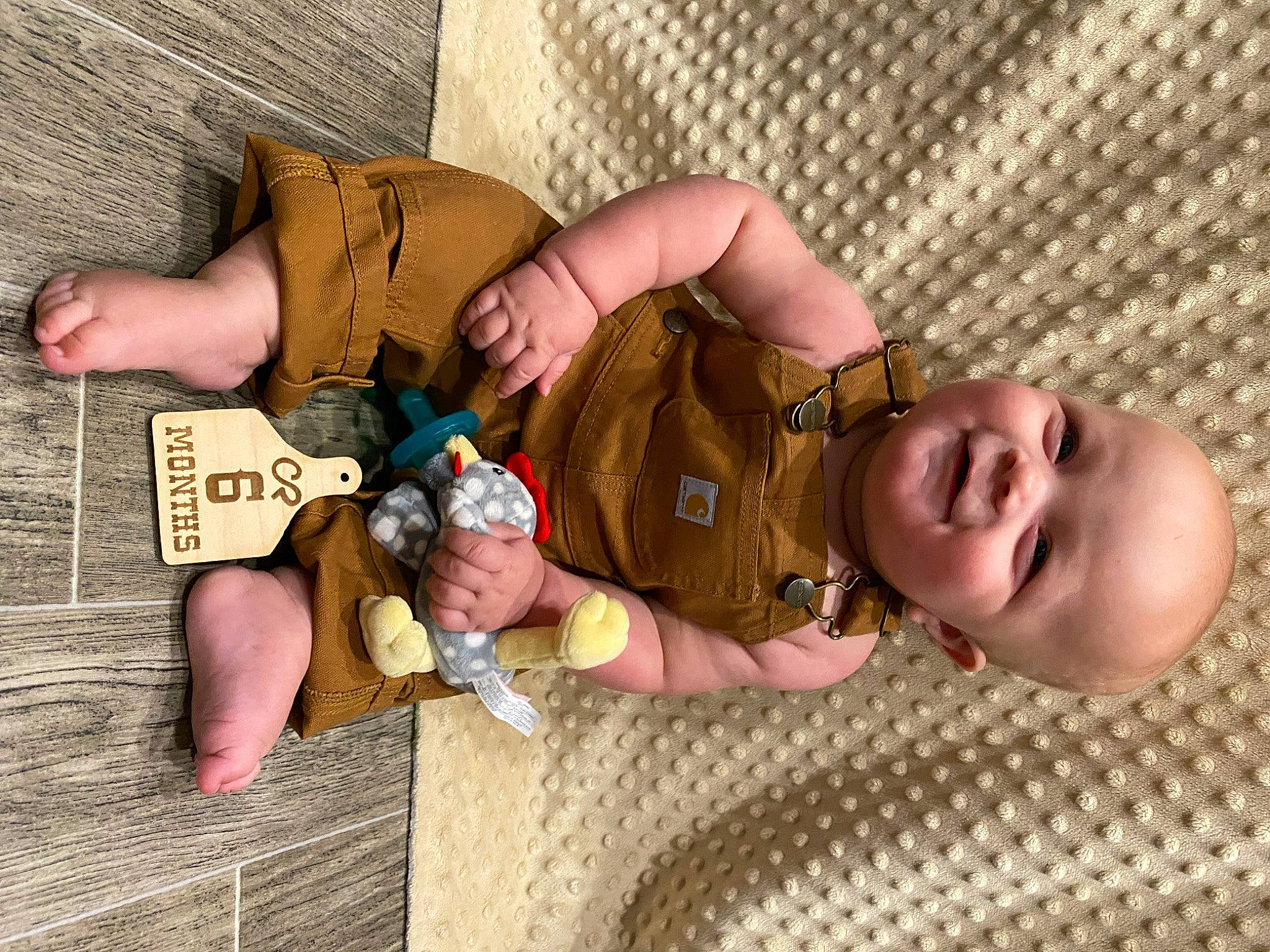 Canyon is registered to the contest to win money with this photo: arm, baby, baby_toddler_clothing, child, finger, fun, hand, handwriting, happy, headgear, joy, mammal, mouth, nail, person, skin, smile, thumb, toddler, vertebrate