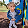 toddler, child, pigtails, denim_jacket, pajamas, white_shoes, playground, outdoor, grass, tree, blue_sky, clouds, smiling, happy, playing, colorful, reflection, mirror, park, daytime