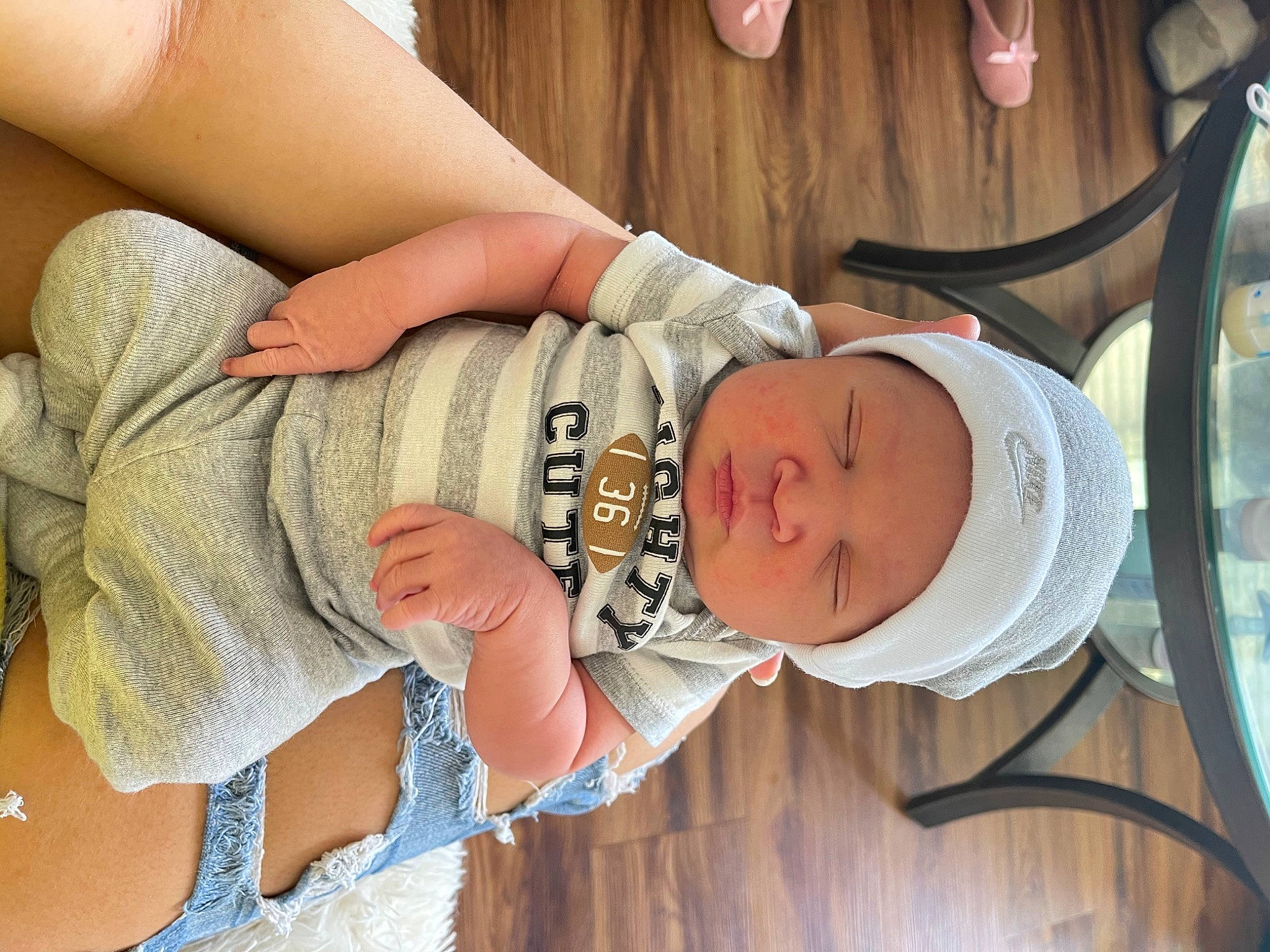 Julien is registered to the contest to win money with this photo: arm, baby, baby_toddler_clothing, comfort, eye, finger, gesture, hand, headwear, human, human_body, joint, mammal, mouth, person, product, skin, stomach, thigh, toddler