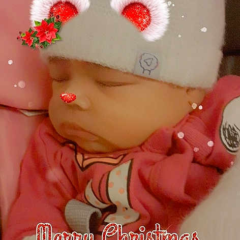 Kany participe au concours pour gagner de l'argent avec cette photo : baby, baby_toddler_clothing, cap, child, doll, eyelash, fashion_accessory, flower, font, hair_accessory, happy, headgear, headpiece, knit_cap, lip, pattern, petal, pink, skin, toy