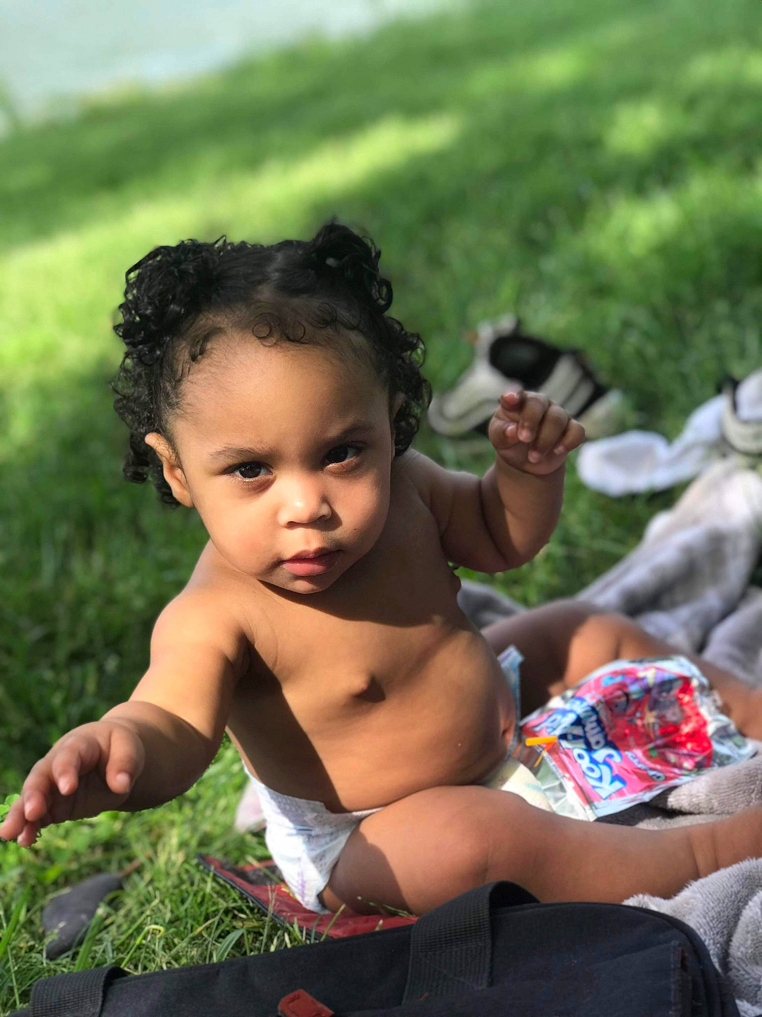 Kayliana joined the competition — help win amazing prizes! arm, baby, child, finger, flash_photography, fun, grass, happy, lap, leisure, people_in_nature, person, plant, recreation, sitting, sock, summer, thigh, toddler, tree