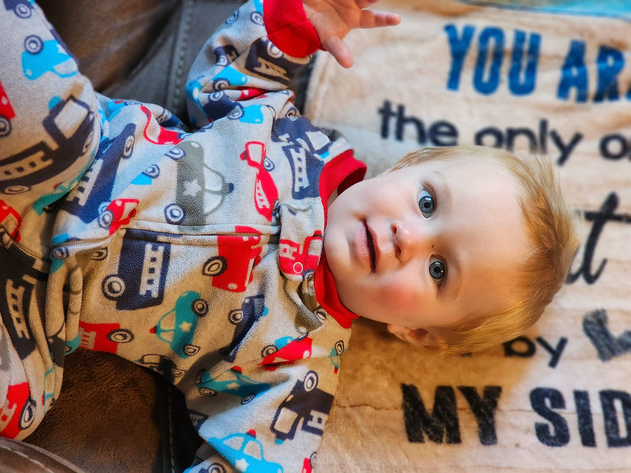 Aiden is registered to the contest to win money with this photo: baby, baby_products, baby_toddler_clothing, carmine, cheek, child, event, eyelash, fun, fur, happy, leisure, pattern, person, play, skin, textile, toddler