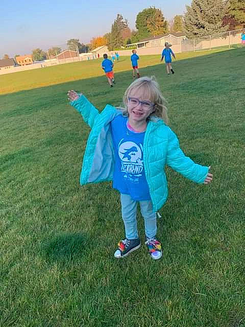 Abigail joined the competition — help win amazing prizes! electric_blue, fun, grass, grass_family, grassland, happy, joy, landscape, lawn, leisure, meadow, natural_environment, people_in_nature, person, plain, prairie, recreation, sky, smile, toddler