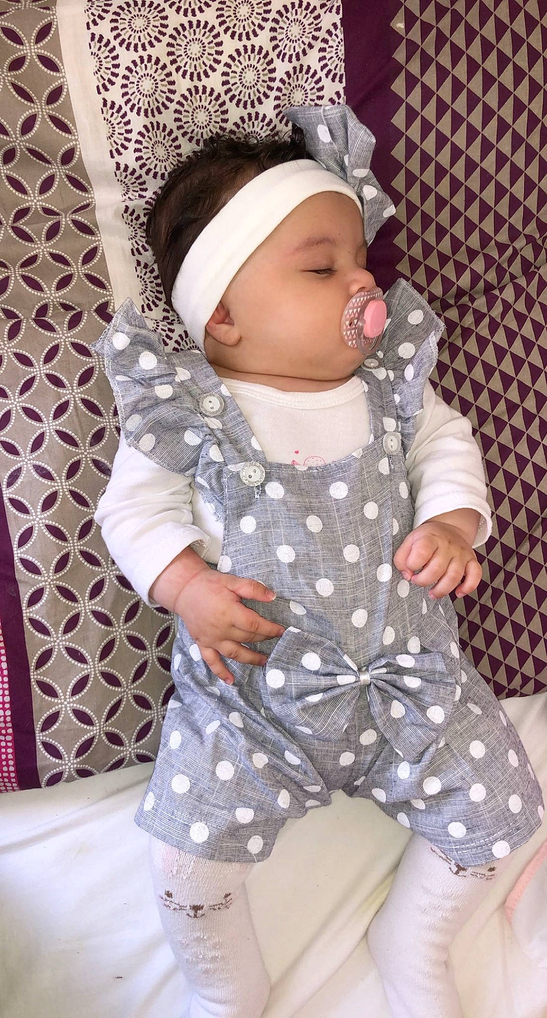 Lorenza a rejoint le concours — aidez-le/la à gagner de superbes lots ! baby, baby_products, baby_toddler_clothing, beauty, cap, cheek, child, collar, comfort, face, fashion_accessory, headgear, headwear, outerwear, pattern, person, pink, purple, sleeve, textile