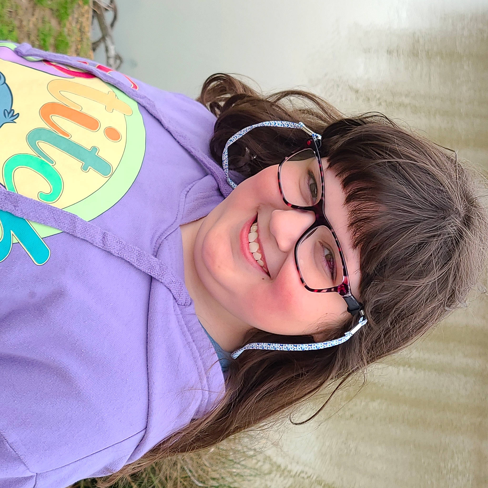 Taylor is registered to the contest to win money with this photo: black_hair, comfort, eye, eyelash, eyewear, fun, glasses, grass, happy, jaw, joy, leisure, lip, mouth, neck, nose, person, personal_protective_equipment, plant, skin