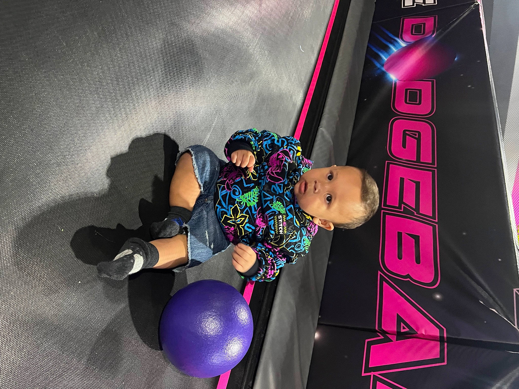 Kairo is registered to the contest to win money with this photo: baby_toddler_clothing, balloon, child, electric_blue, entertainment, event, font, fun, happy, leisure, magenta, party_supply, person, pink, purple, recreation, thigh, toddler, toy, violet
