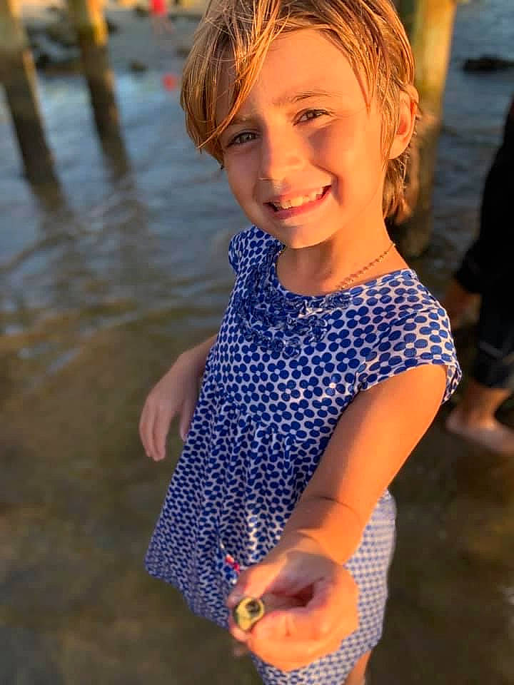 Evangeline joined the competition — help win amazing prizes! beauty, child, electric_blue, facial_expression, fun, gesture, hair, hairstyle, hand, happy, human, joy, lake, leisure, pattern, people_in_nature, people_on_beach, person, smile, summer