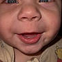 Leo is registered to the contest to win money with this photo: baby, close_up, smiling, blue_eyes, infant, onesie, cute, face, child, happy, skin, mouth, nose, eyelashes, cheeks, winnie_the_pooh, clothing, portrait, expression, young_child