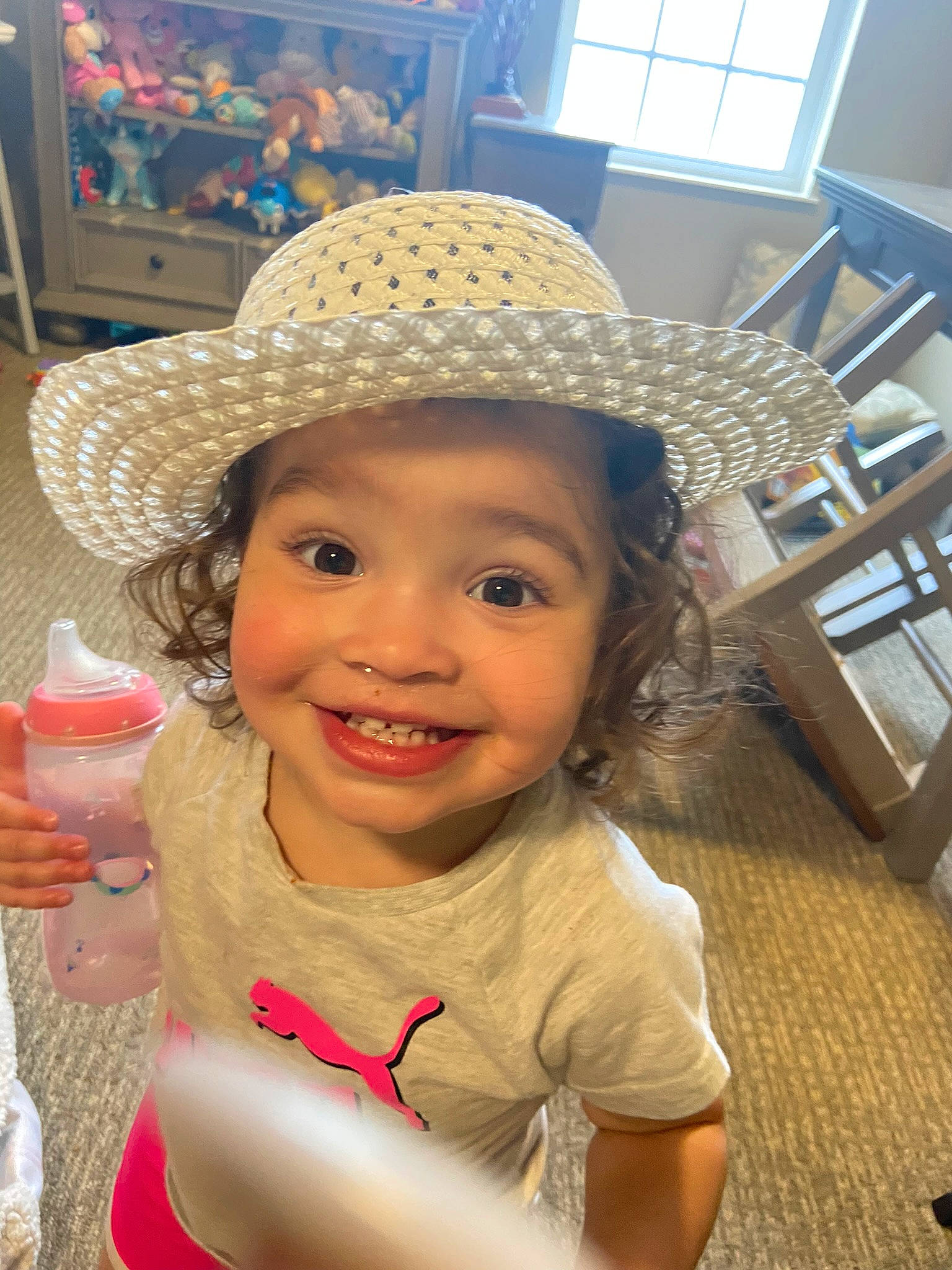 Charliegh joined the competition — help win amazing prizes! baby, blond, cheek, child, chin, eye, face, flooring, fun, happy, hat, headwear, iris, joy, juice, lip, mouth, person, skin, smile