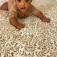 K.c joined the competition — help win amazing prizes! baby, child, infant, crawling, bed, bedding, blanket, pattern, indoor, person, cute, young, face, skin, hands, clothing, head, expression, curious, home