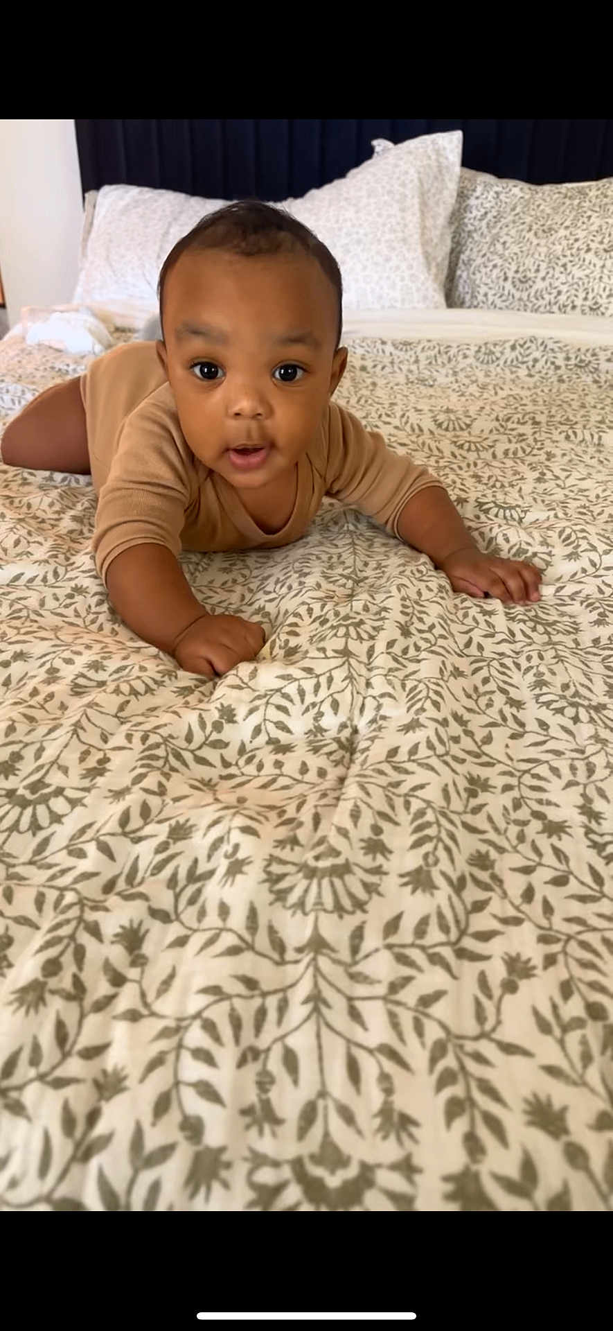 K.c joined the competition — help win amazing prizes! baby, child, infant, crawling, bed, bedding, blanket, pattern, indoor, person, cute, young, face, skin, hands, clothing, head, expression, curious, home