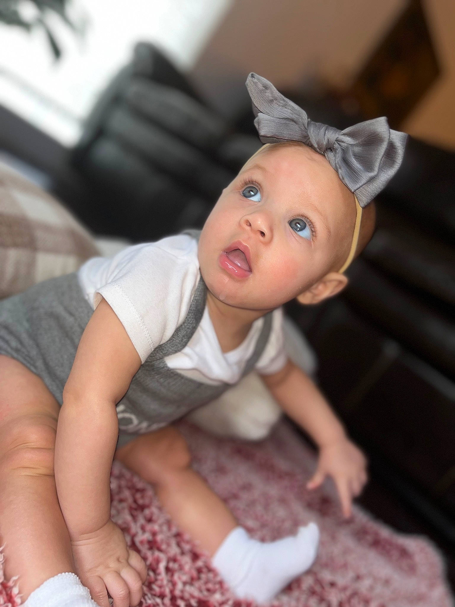 Ameila joined the competition — help win amazing prizes! arm, baby, baby_toddler_clothing, fawn, finger, flooring, fun, hairstyle, happy, hat, human_leg, person, pink, sitting, skin, sleeve, surprise, thigh, toddler, toy