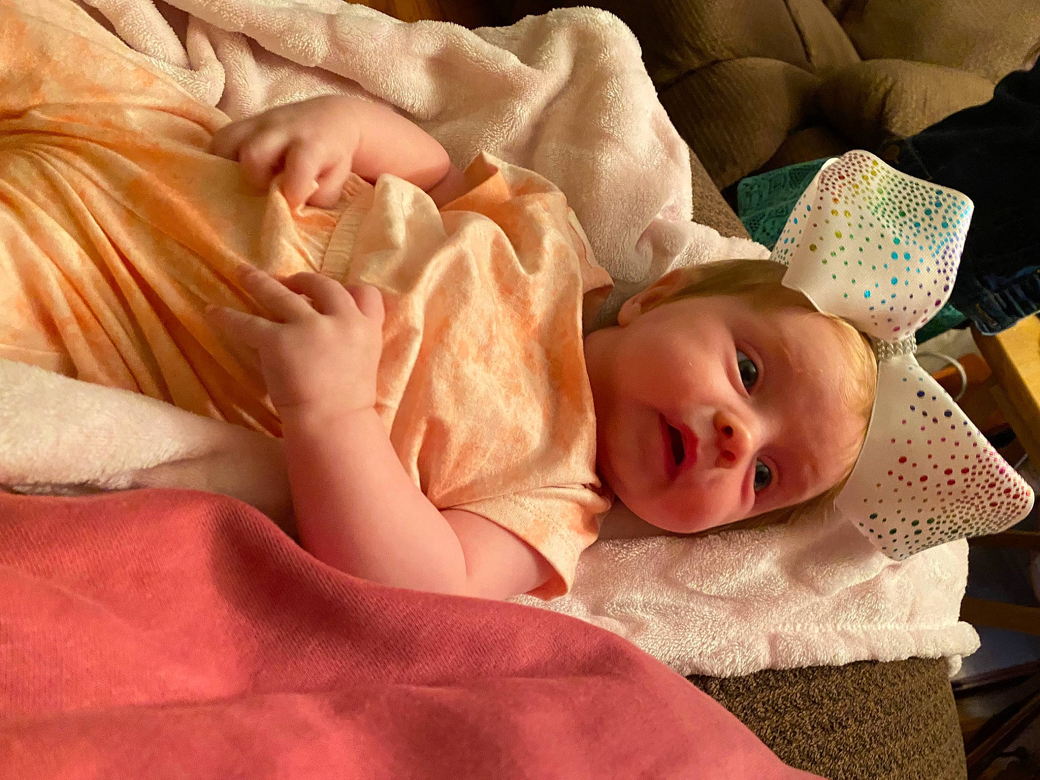 Madelynn joined the competition — help win amazing prizes! baby, baby_sleeping, baby_toddler_clothing, bedding, bedtime, cheek, child, comfort, couch, eye, fur, gesture, hat, linens, person, room, skin, sleeve, toddler, vertebrate