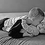 black_and_white, baby, bed, brother, child, clothing, cuddle, family, gentle, hug, infant, kiss, laying_down, love, monochrome, older_child, portrait, sibling, smile, toddler