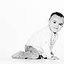 toddler, child, smiling, crawling, white_shirt, jeans, barefoot, studio, portrait, baby, cute, happy, innocent, young, person, kid, candid, monochrome, black_and_white, studio_lighting