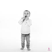 Pablo a rejoint le concours — aidez-le/la à gagner de superbes lots ! toddler, child, barefoot, standing, jeans, shirt, black_and_white, playful, funny_face, studio, portrait, isolated, young_child, expression, full_body, casual_clothing, smiling, candid, white_background, cute